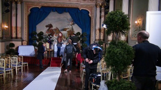 Celebrity Wedding with Helen Flanagan & Hugo, theatre ceremony room decorated with topiary and white aisle