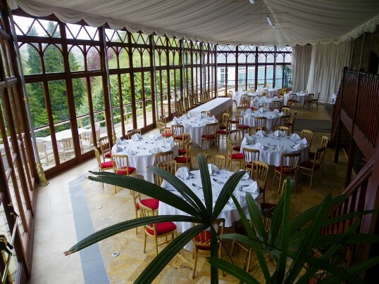 Craig y Nos Castle Wedding Venue Swansea Conservatory with tables set up ready for wedding