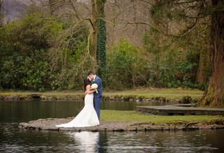 Wedding Couple by Craig y Nos Country Park Lake by Gareth Jones Wedding Photographer