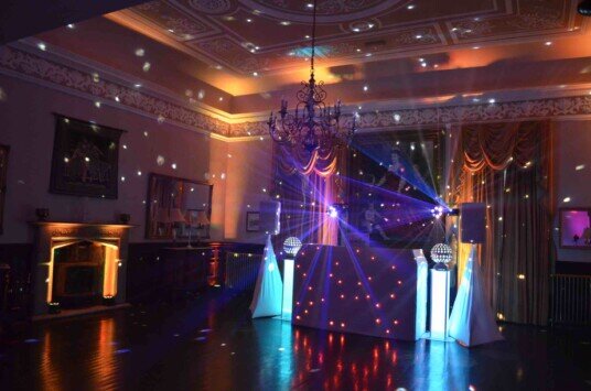 Amber Uplighting available from Pure Weddings DJ at Craig y Nos Castle Evening Wedding Package Wedding Venue South Wales Craig y Nos Castle