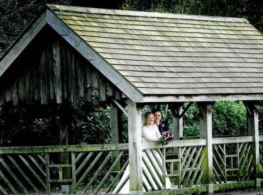 Couple in the boathouse main lake Craig y Nos Country Park Ceremony Only Weddings Venue South Wales Craig y Nos Castle