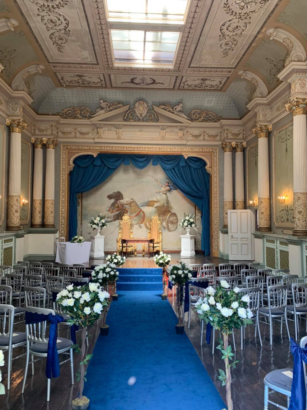 Wedding Ceremony Room Blue Chairs at Craig y Nos Castle