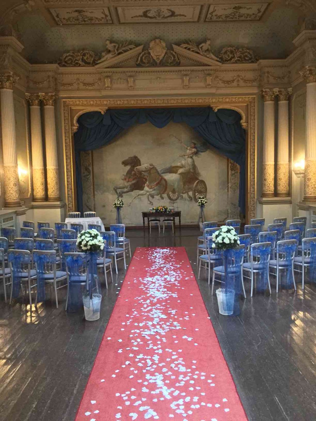 Wedding Ceremony Room Blue Chairs at Craig y Nos Castle