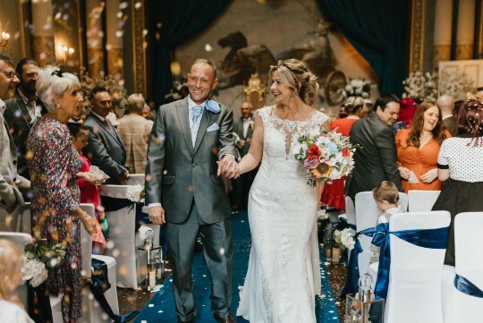 Wedding Couple in the Ceremony Room at Craig y Nos Castle Rachel Lambert Photography