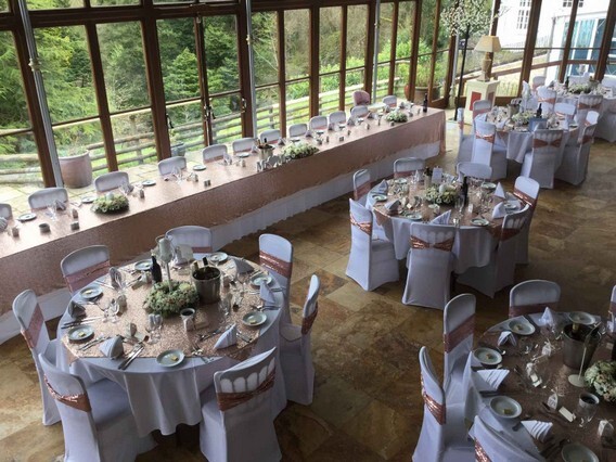 Conservatory wedding reception gold and white table decor