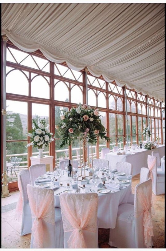 Craig y Nos Castle Wedding Venue Swansea Conservatory with light purple chair covers
