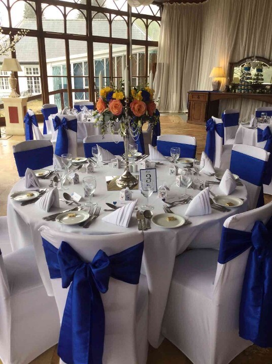 Marriage Venue Wales Craig y Nos Castle Conservatory blue sashes