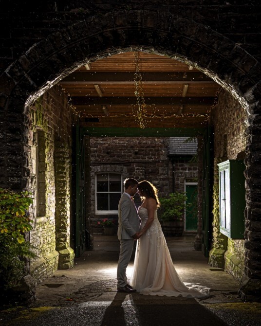 Under arch Craig y Nos Castle wedding venue Cardiff