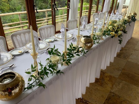 Craig y Nos Castle Wedding Venue Swansea Conservatory Wedding Breakfast pale yellow ribboned chair covers