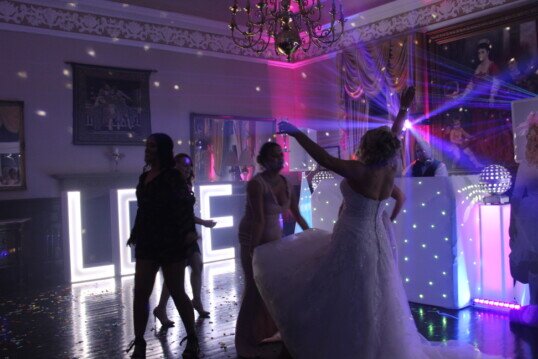 Pure Weddings DJ guests party on dance floor Pure Weddings DJ guests party on dance floor