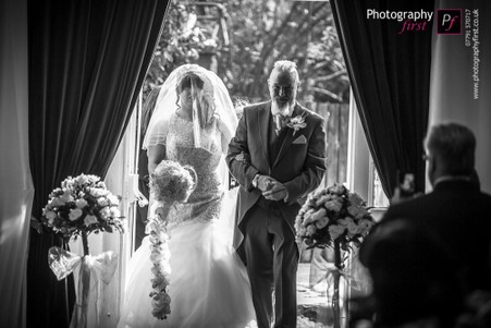 Bride enters theatre at Craig y Nos Castle Bride theatre entrance wedding ceremony craig y nos castle