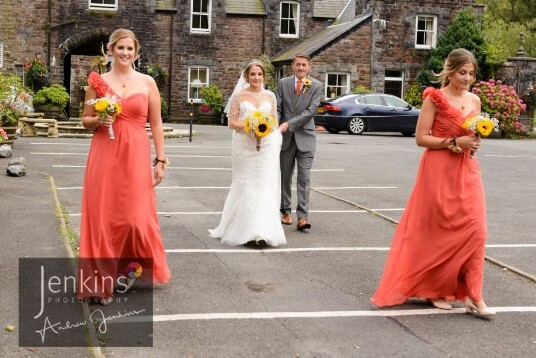 Bride and Bruidesmaids in Courtyard at Craig y Nos Castle