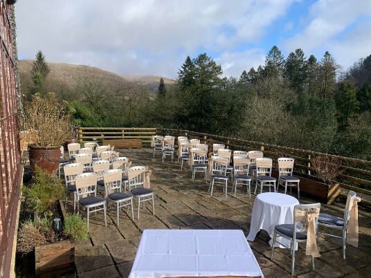 Wedding Ceremony outside at Craig y Nos Castle