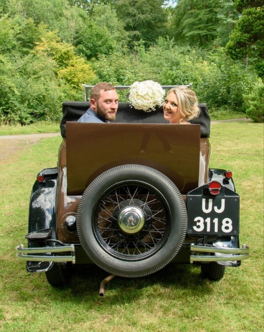 Couple in Craig y Nos Wedding Venue lower gardens