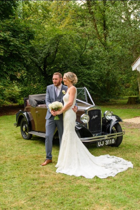 Couple in Craig y Nos Wedding Venue lower gardens