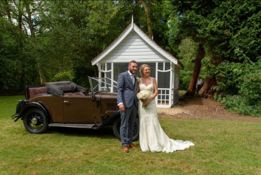 Couple in front of the summer house