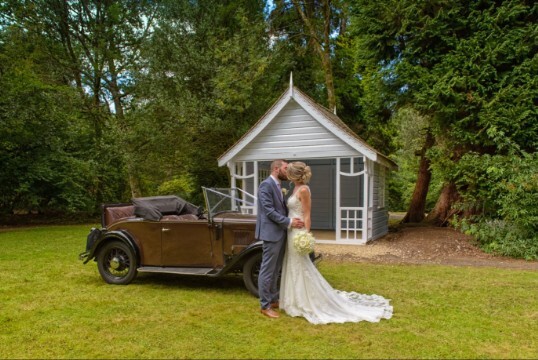 Couple in front of the summer house