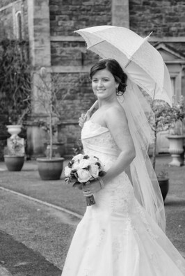 Ann Lewis Wedding Photography bride outside theatre at Craig y Nos Castle South Wale