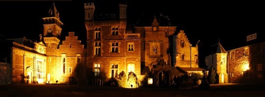 Craig y Nos Castle floodlit at night