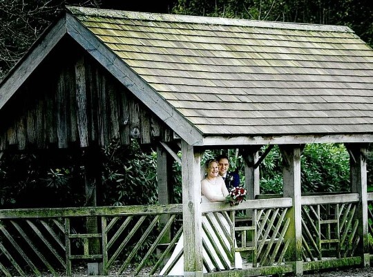 Couple on Boating Lake at Craig y Nos Country Park Wedding Planning Book, Couple on Boating Lake at Craig y Nos Country Park
