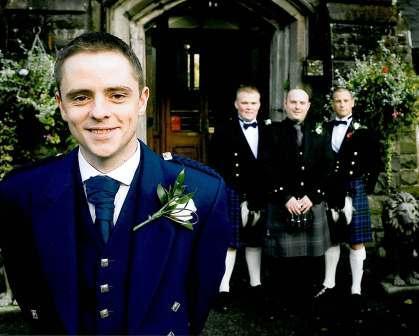 Groom and some best men outside the front door at Craig y Nos Castle Wedding Planner Book, Craig y Nos Castle