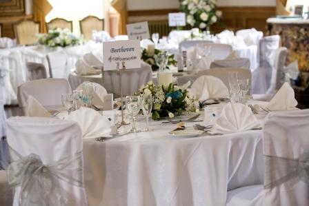 Wedding Tips, Wedding Breakfast table setting, Photograph by Celtic Photography Craig y Nos Castle in South Wales Wedding Breakfast table setting white table cloths and white napkins