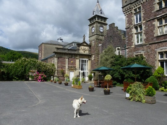 Craig y Nos Castle clocktower and to its left, the front of the theatre with its double height glass doors