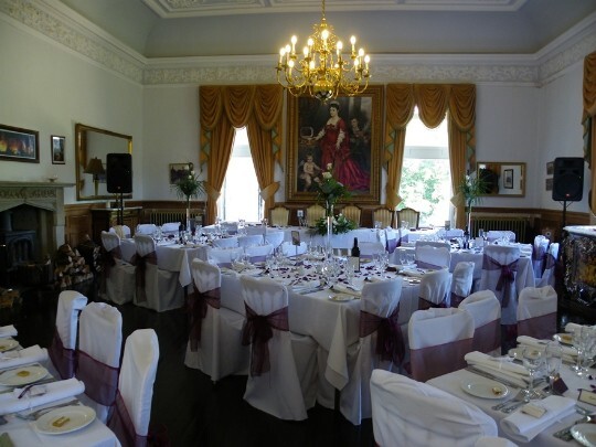 Looking through from the Billiard Room into the Music room half of what is now the evening function room Craig y Nos Castle Wedding Venue with Function room set up for a wedding breakfast