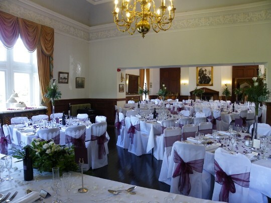 Looking through from the far end of the function room, the music room, through to billiard room half Craig y Nos Castle Wedding Venue the Function Room in use for a wedding breakfast