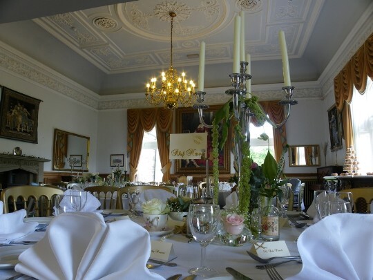 Looking up to the blue and white ornate carved and moulded ceiling of the music room at Craig y Nos Castle Craig y Nos Castle Wedding Venue main function room and music room