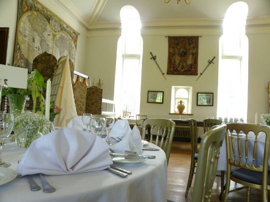 Billiard Room hald of the main function room when ceiling pale blue - it has since been painted creams and gold Craig y Nos Castle Wedding Venue Swansea Function Room looking towards the swords