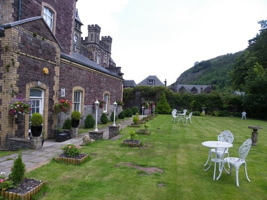 Craig y Nos Castle Wedding Venue Swansea Theatre Gardens with one side of theatre showing on left