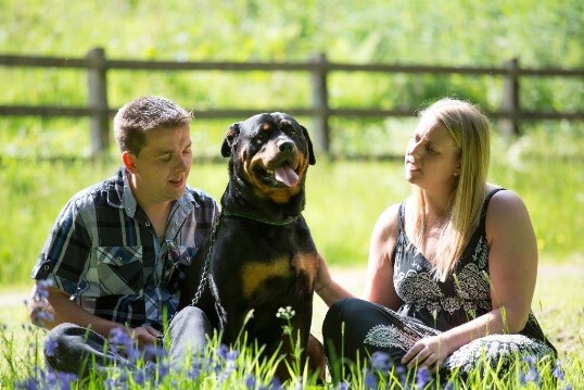 Craig y Nos Castle Wedding Venue lower gardens, wedding couple relax with their dog before wedding day