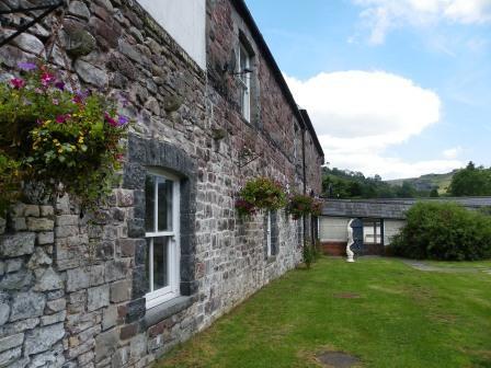 Craig y Nos Castle Nurses Block Grass looking along one side of the Atrium Building housing some ensuites Wedding Venues South Wales - Craig y Nos Castle Nurses Block Grass