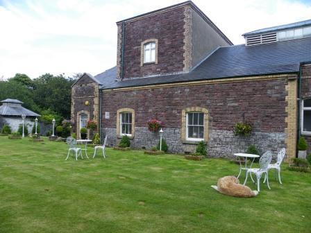 Craig y Nos Castle Theatre Gardens looking on to the side of the theatre itself Wedding Venues South Wales - Craig y Nos Castle Theatre Gardens