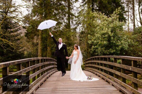 Wedding Reception Swansea, Craig y Nos Country Park Bride and Groom on Bridge by Jenkins Photography