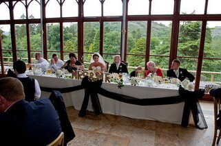 Kevin John Wedding Photography Bridal Party on Head Table in the Conservatory at Craig y Nos Castle South Wales