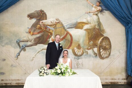 Wedding Photography by Nigel Pullen Photography, Couple in front of Curtain at Craig y Nos Theatre