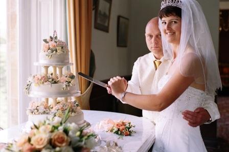 Bride and Groom Wedding Cake Cutting, South Wales Wedding Venue Craig y Nos Castle