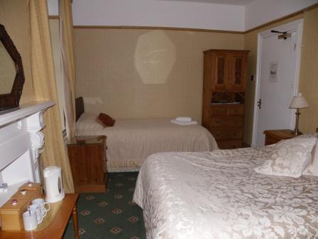Craig y Nos Castle Theatre Ground Right En-suite bedroom, can be used as a triple bedded room Wedding Venues South Wales - Craig y Nos Castle Accommodation Room Theatre Ground Right