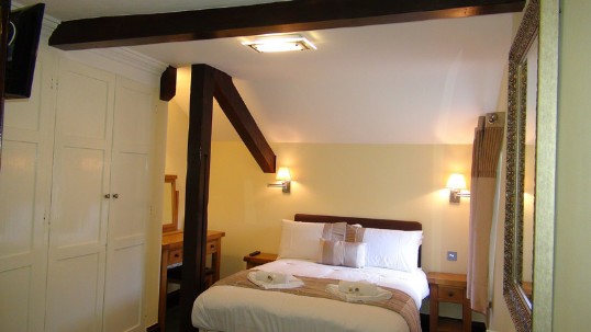 Theatre Loft bedroom as seen from entrance door Wedding Venues Wales - Theatre Loft en-suite Bedroom