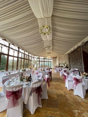 Conservatory with Burgundy Bows and White 01.jpg